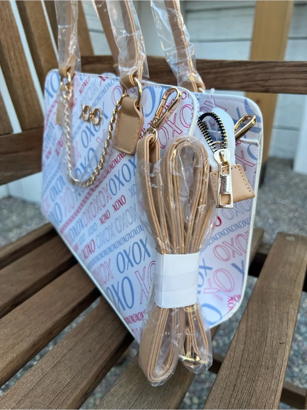 XOXO White Satchel with Blue and Red Logo Print and Tan Trims